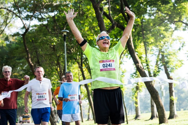 older man winning running race