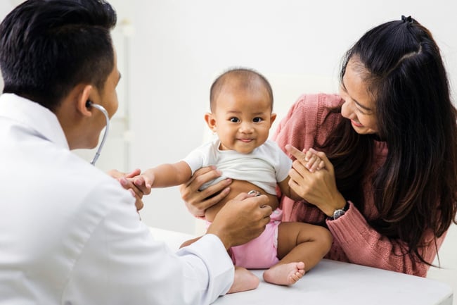 mom and baby with doctor